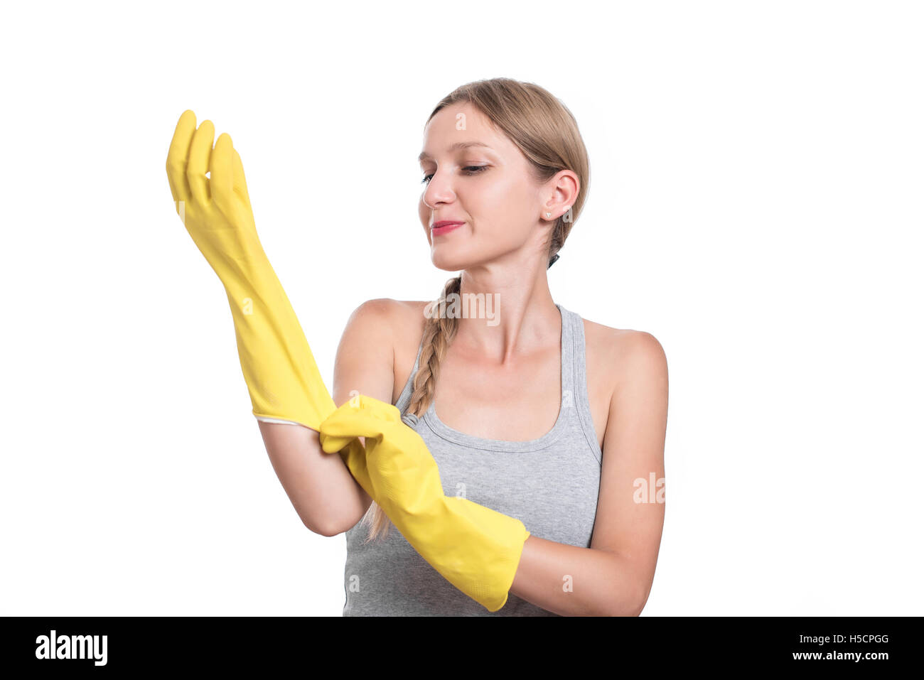 Woman ready for cleaning with rubber gloves and smiling Stock Photo - Alamy
