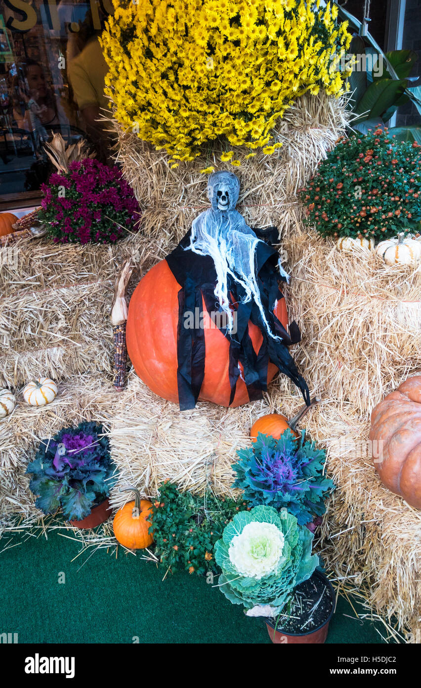 Halloween street display with ghost and pumpkins Stock Photo