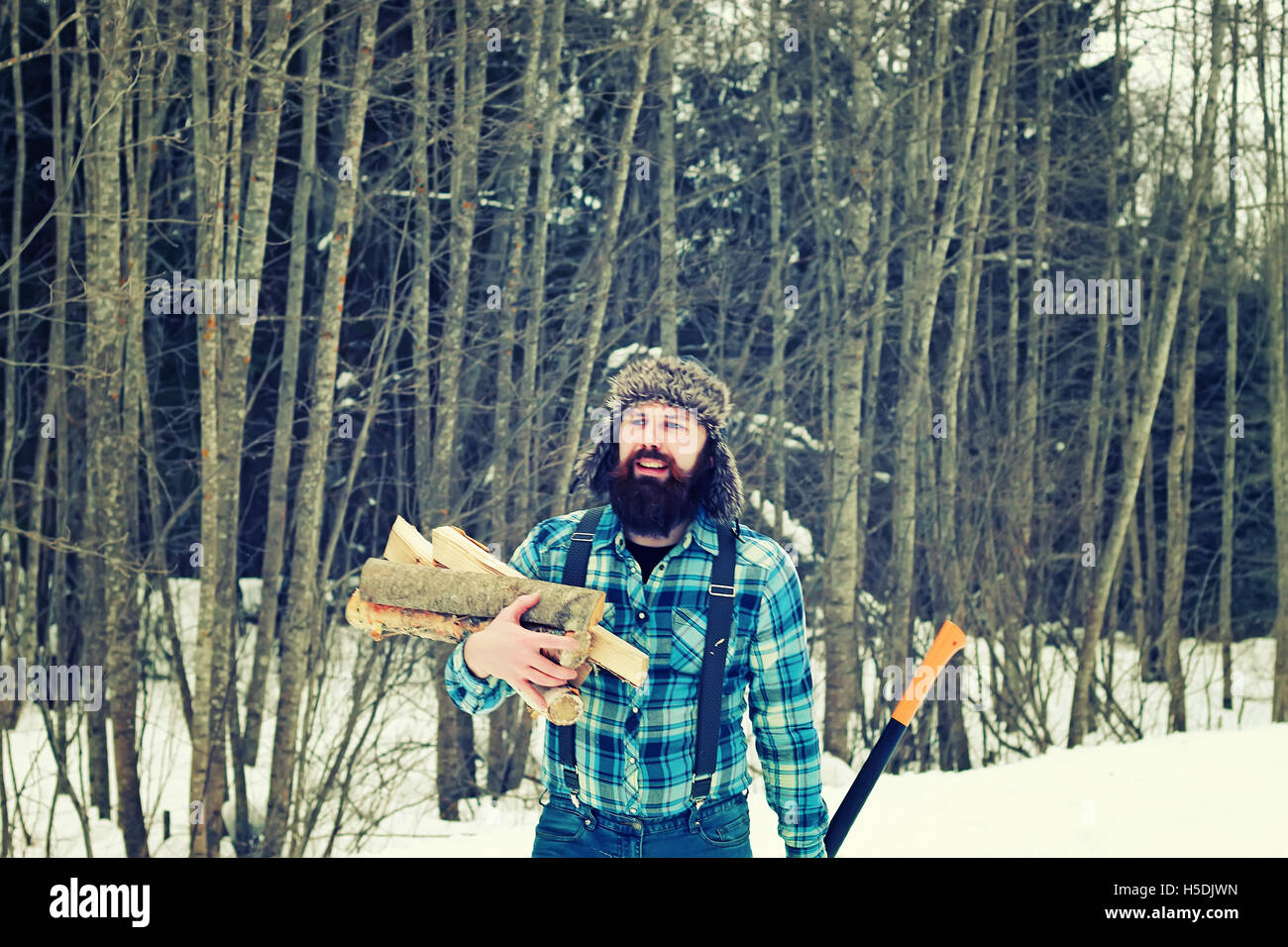 winter man axe wood Stock Photo - Alamy