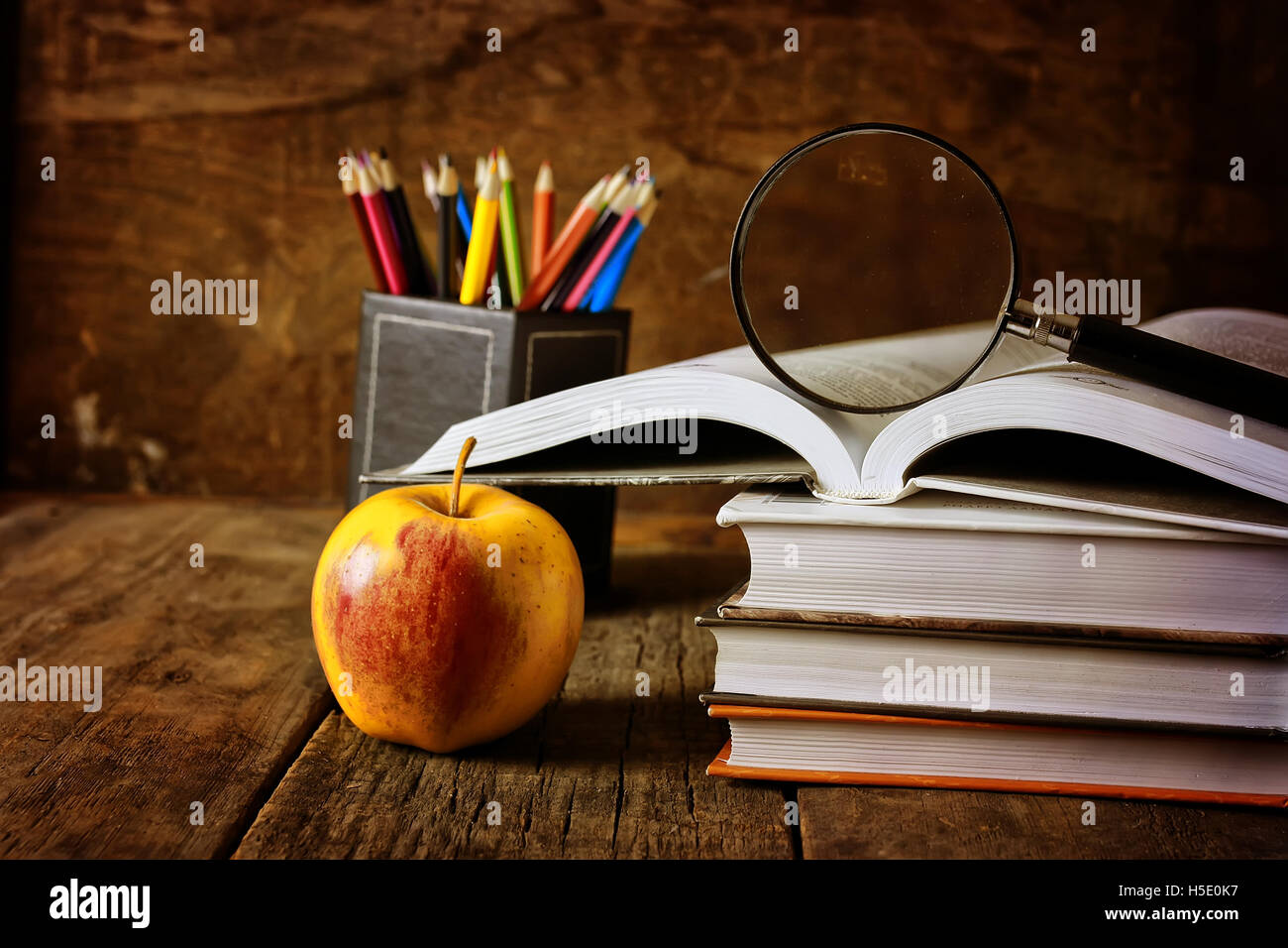 magnifying glass education book Stock Photo Alamy