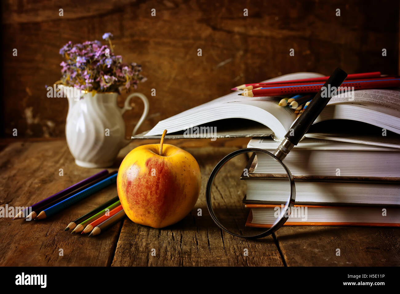 magnifying glass education book Stock Photo Alamy
