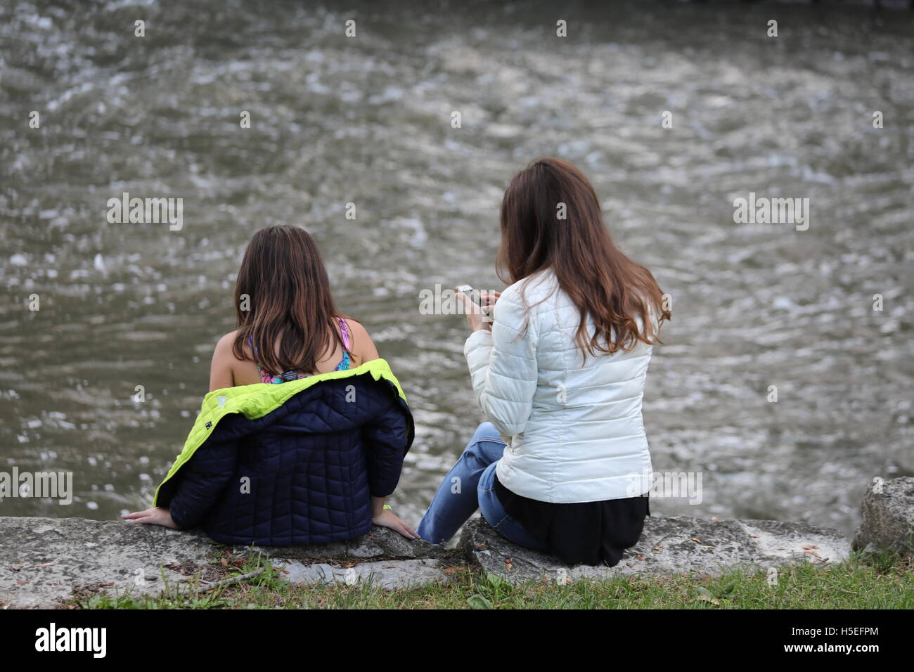 Two girls at the river Stock Photo
