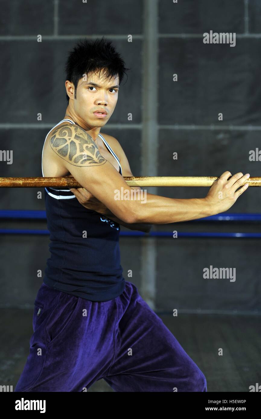 Kung fu stick fighter Stock Photo - Alamy