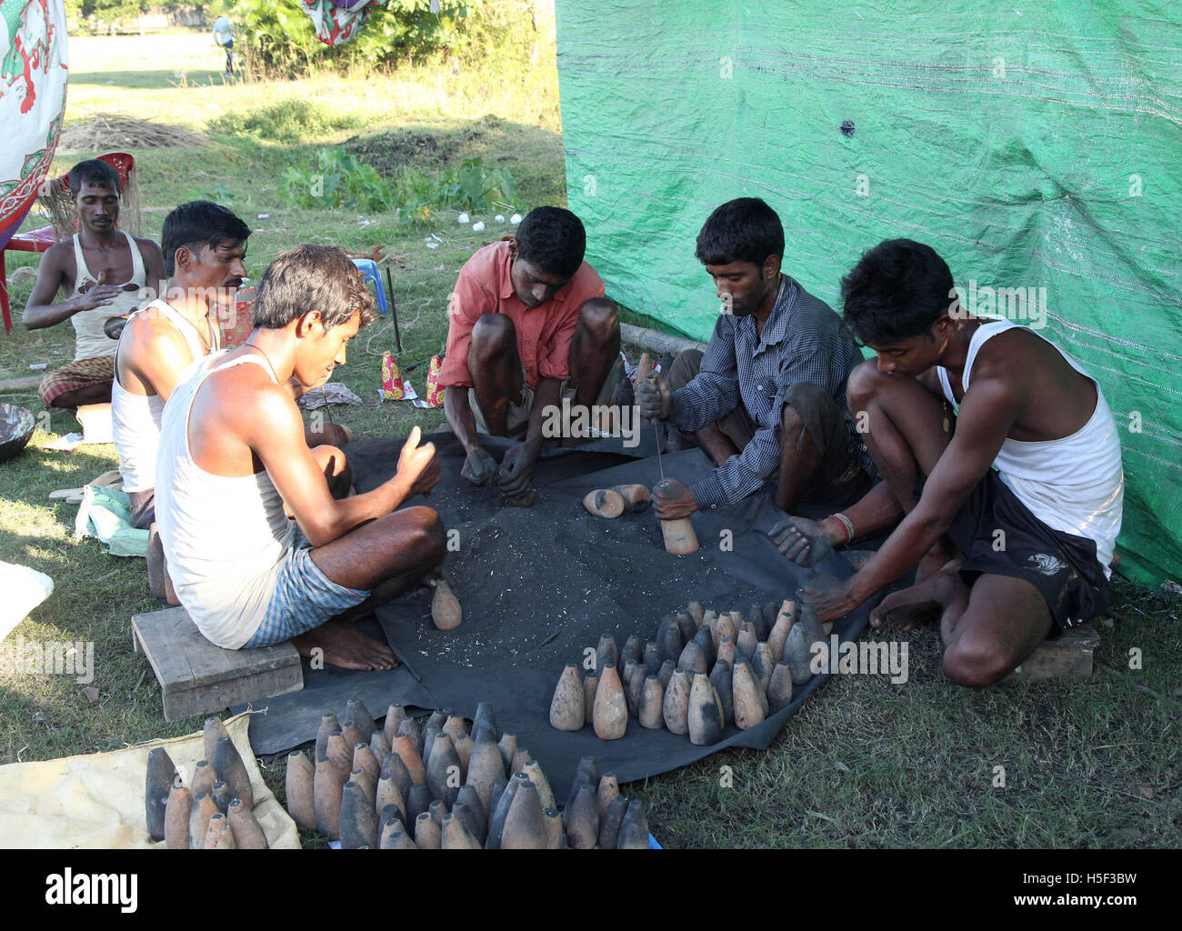 October 20, 2016 - Barpeta, Assam, India - Artisans making traditional  fire crackers ahead of Deepawali festival at Barpeta,Assam . The traditional fire cracker industry in Barpeta  was established in the year 1885 by late Laxmi Pathak  and it is still running successfully  (Credit Image: © Vikramjit Kakati via ZUMA Wire) Stock Photo