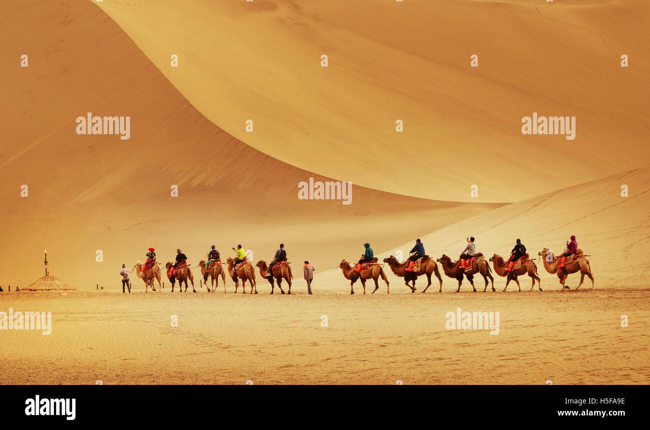 Tourists ride camels crescent hi-res stock photography and images - Alamy
