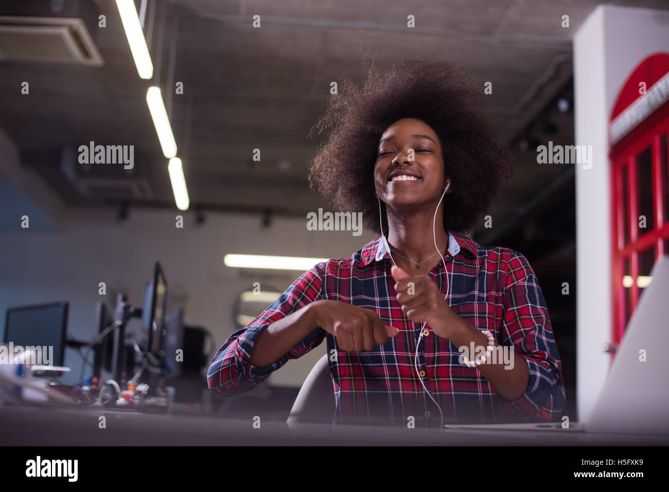 portrait of a young successful African American beautiful woman who ...