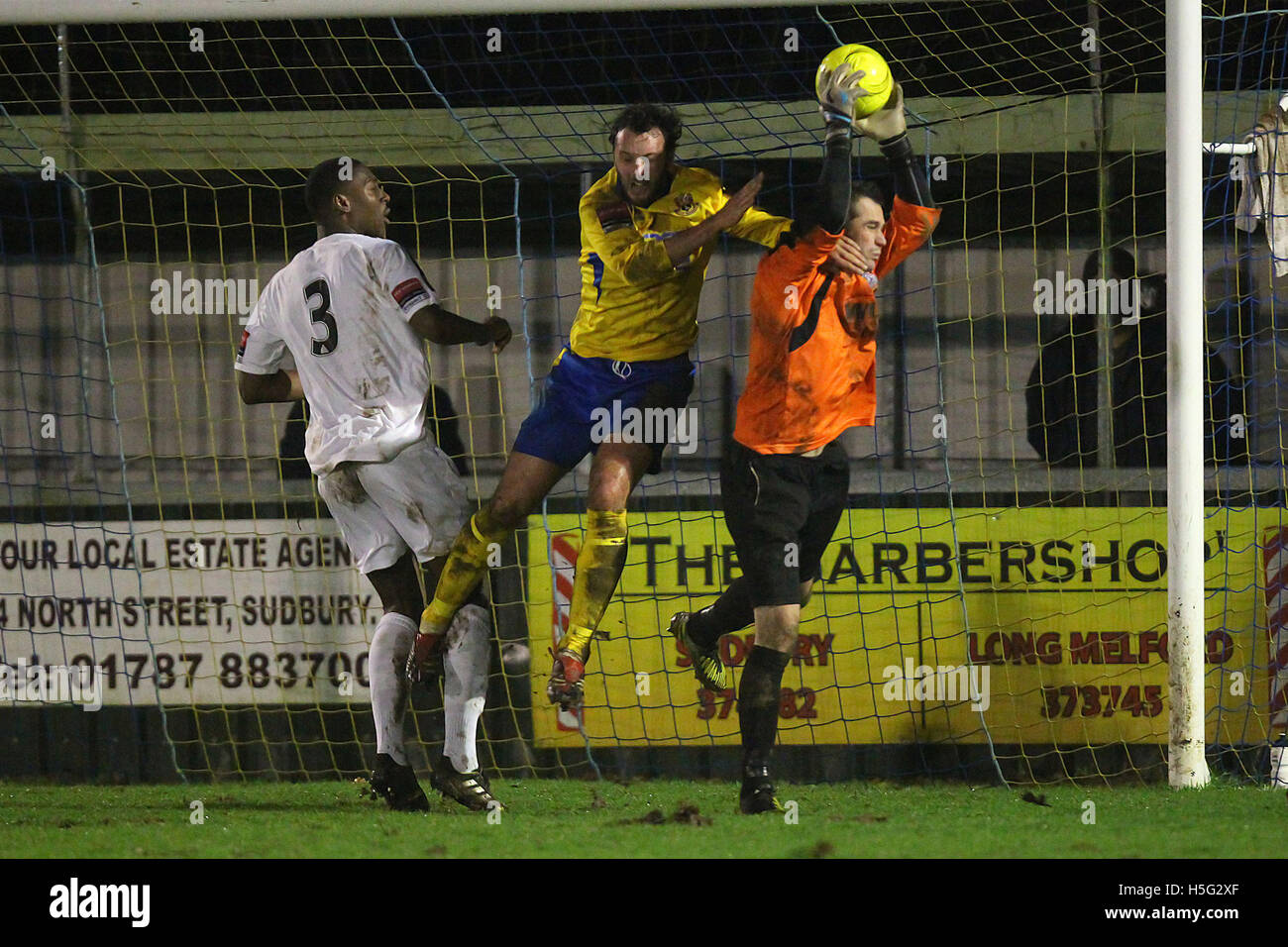 Andy Walker of Thurrock denies James Baker of AFC Sudbury - AFC Sudbury vs Thurrock - Ryman League Division One North Football at the King's Marsh Stadium, Sudbury, Suffolk - 21/12/13 Stock Photo
