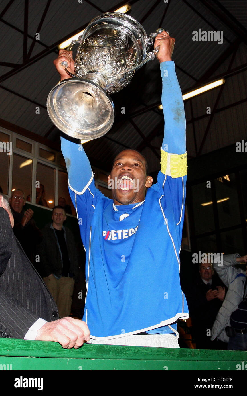 Micah Hyde lifts the Cup - Billericay Town celebrate their Essex Senior Cup victory - Aveley vs Billericay Town - Essex Senior Cup Final at Ship Lane, Thurrock FC - 11/04/11 Stock Photo