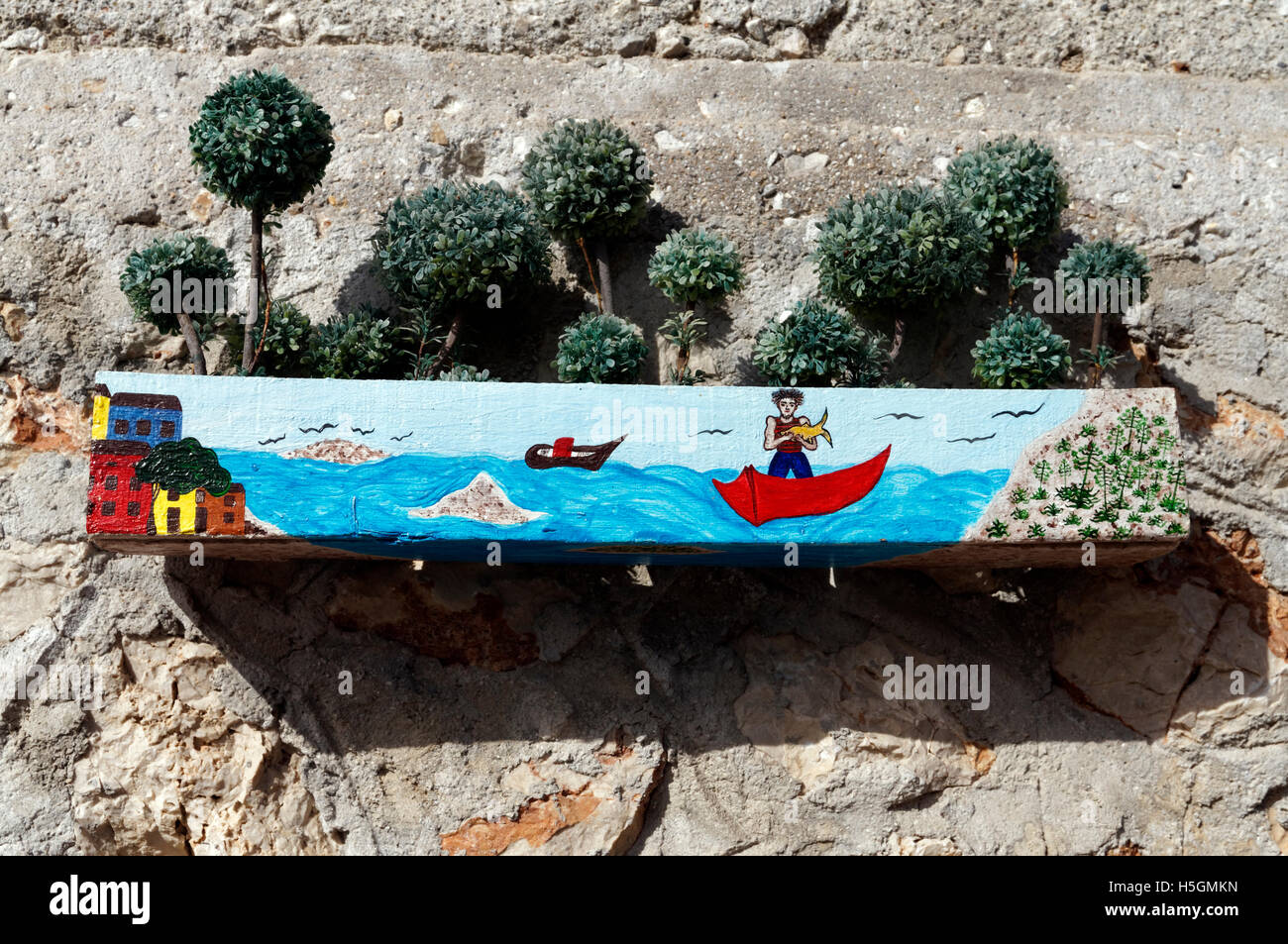 Idividually painted plant pots, Pondamos Beach Taverna, Chalki Island near Rhodes, Dodecanese Islands, Greece. Stock Photo
