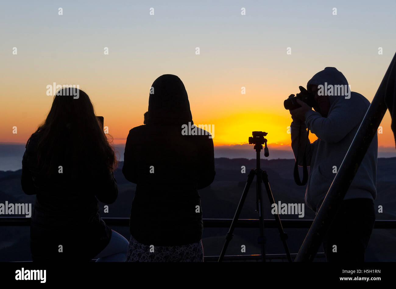 People watching sunrise from Te Mata Peak, Hastings, Hawke Bay, North Island, New Zealand Stock Photo
