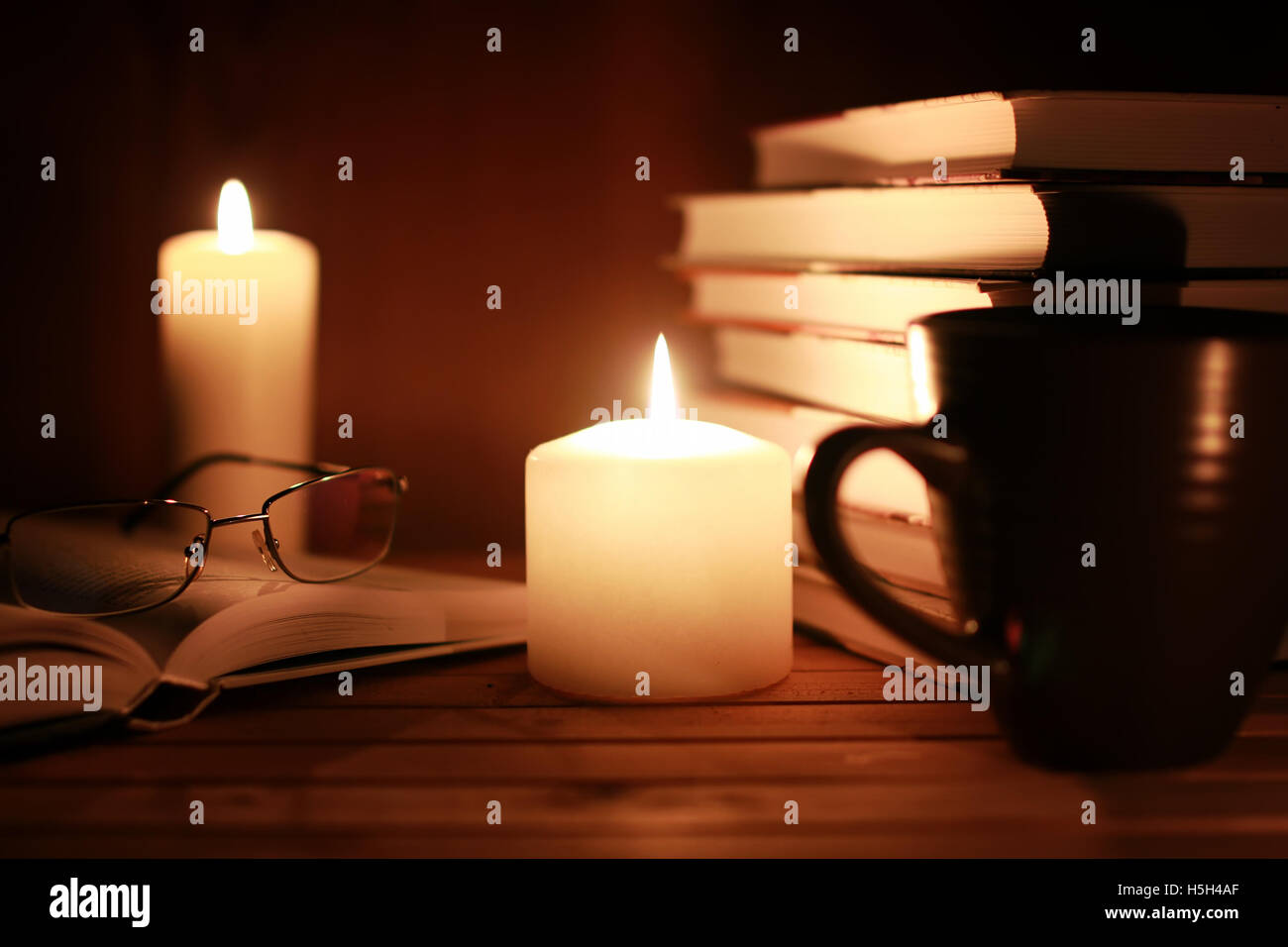 book glasses candle night Stock Photo Alamy
