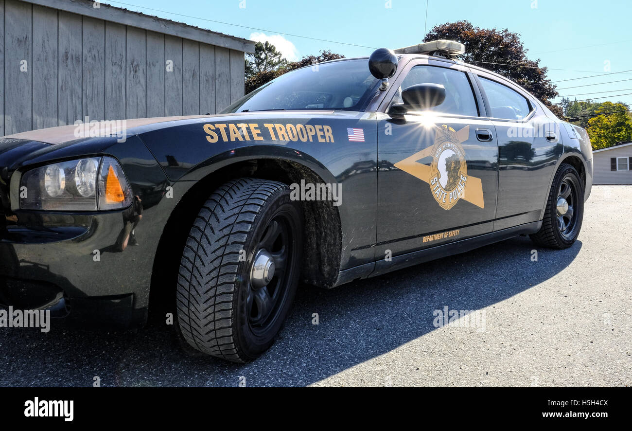 State Trooper pursuit vehicle seen parked up in New Hampshire, United States. The officer is not present in the vehicle. Stock Photo