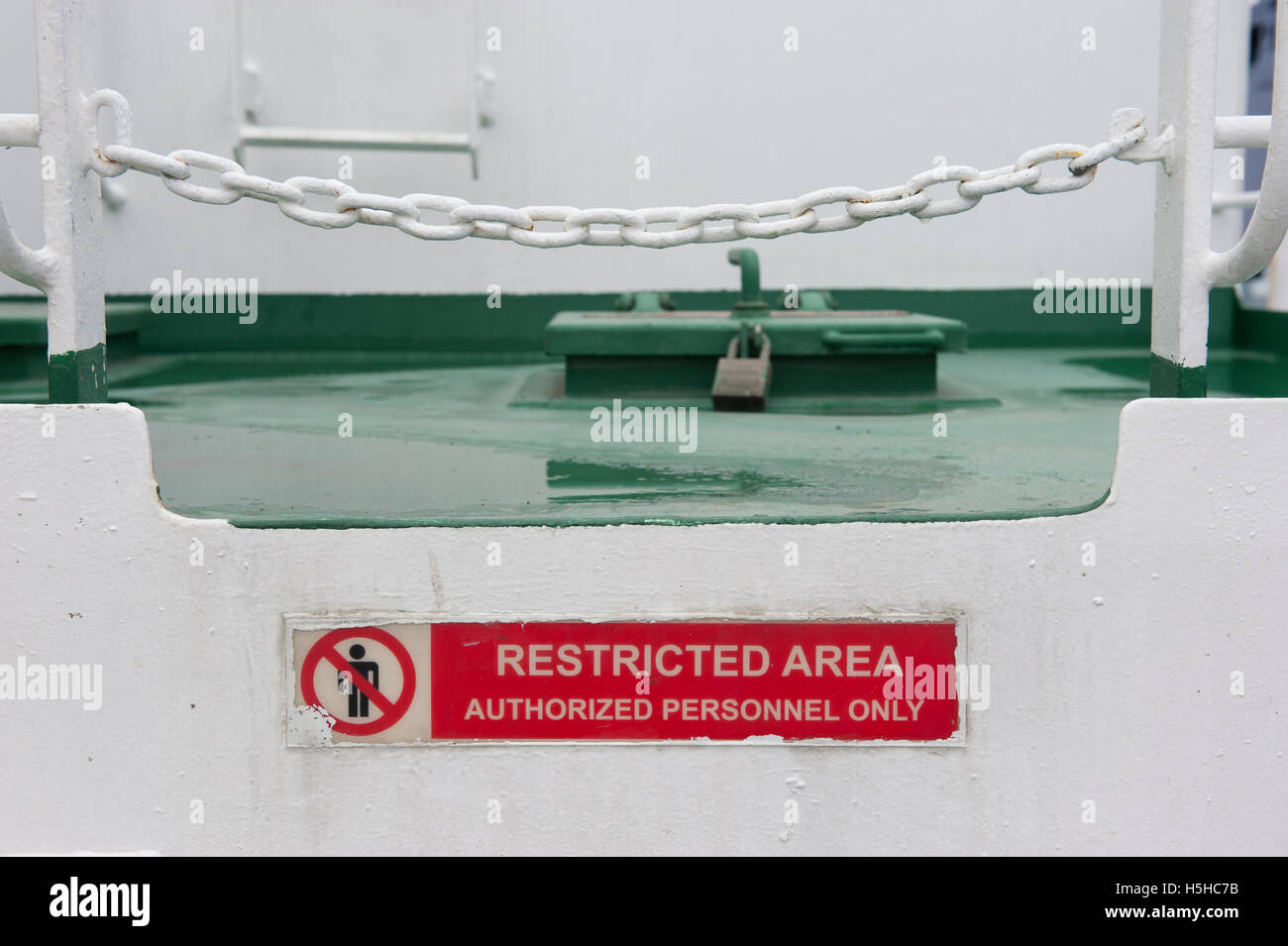 Restricted area warning sign on board a container ship Stock Photo