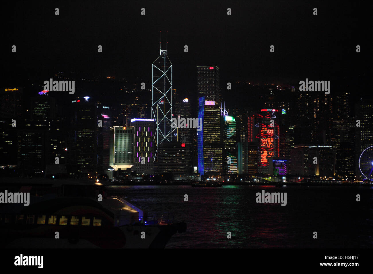 Hong Kong nightly Light Show, the evening skyline of high rise commercial buildings designed by internationally known architects Stock Photo