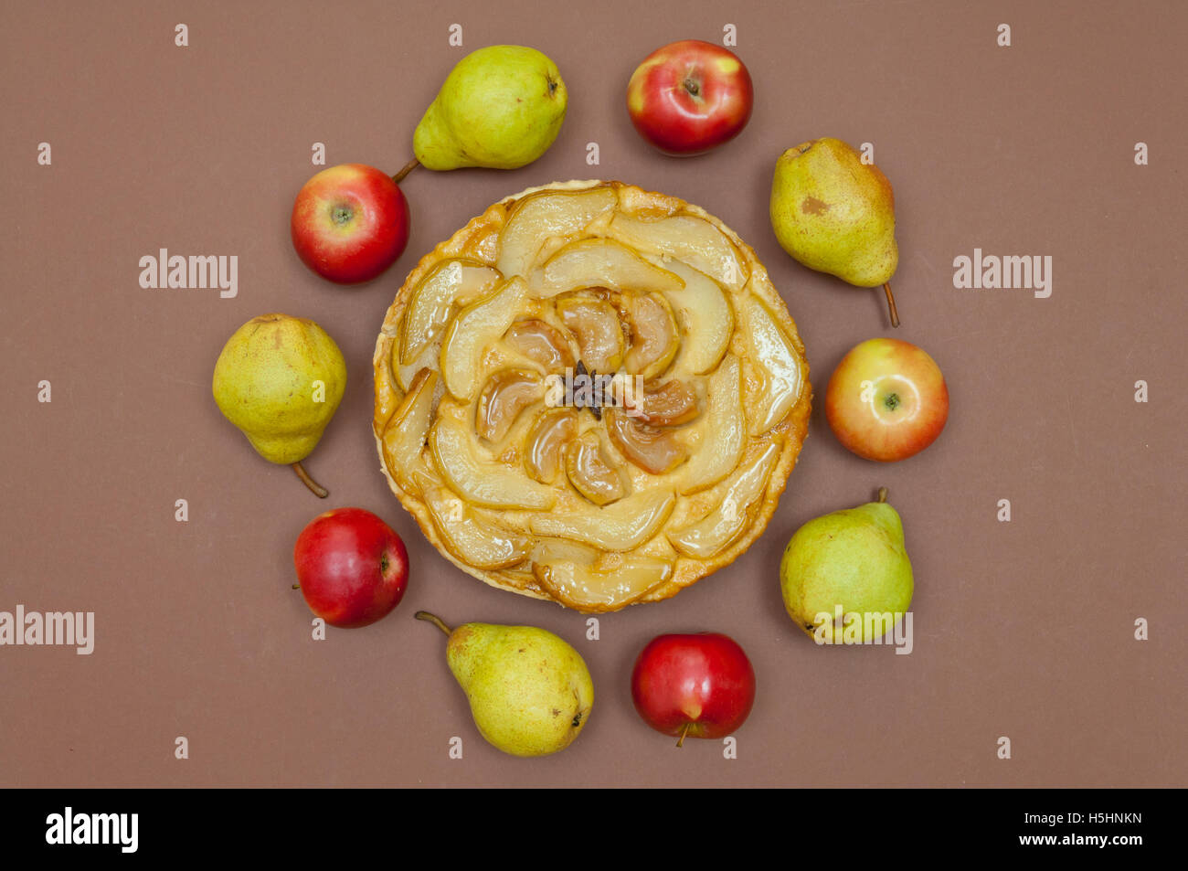 Tarte tatin, apple tart, pear tart on paper background with copy space Stock Photo