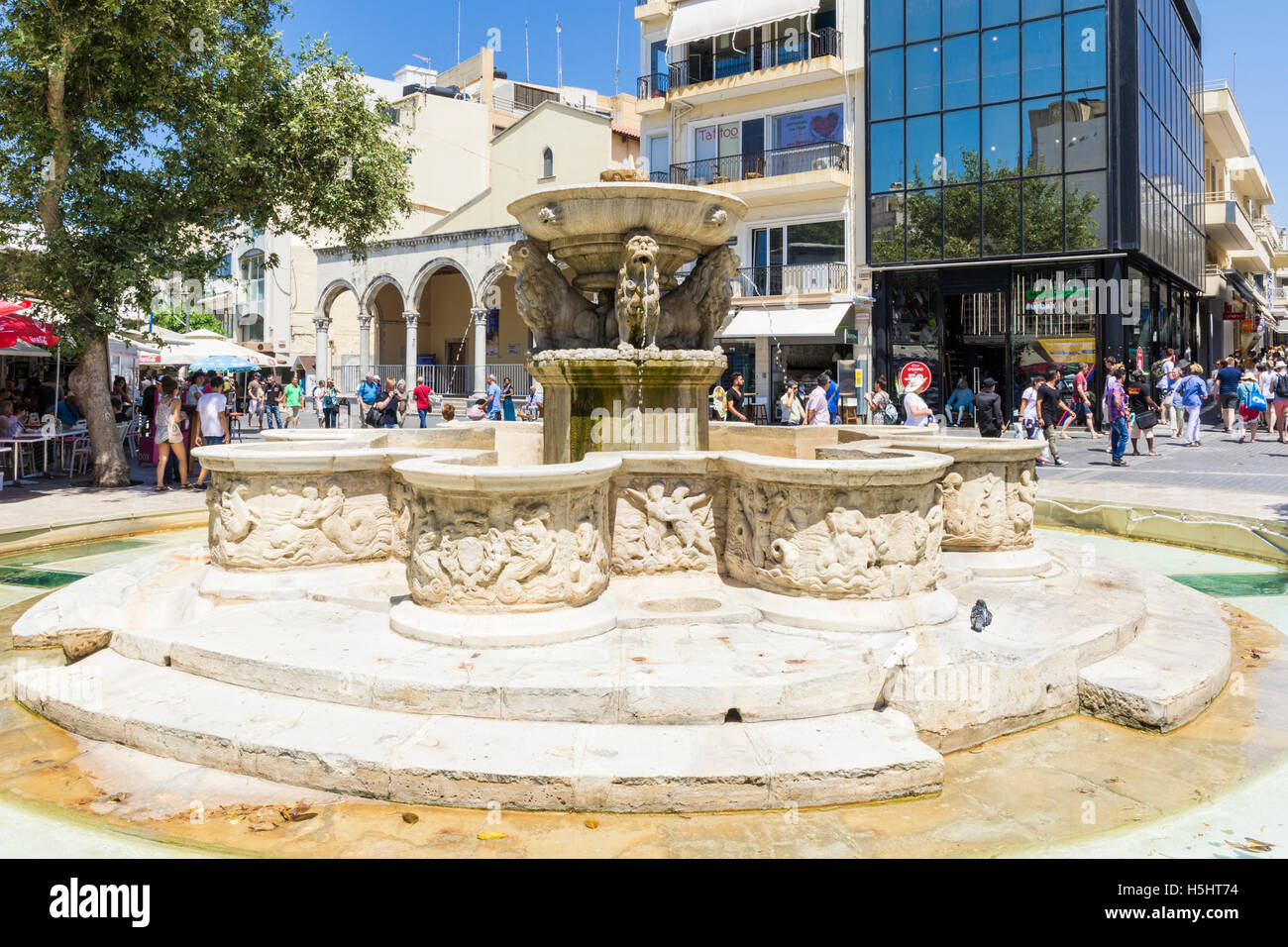 Morosini Fountain in busy Eleftheriou Venizelou Square, Heraklion, Crete, Greece Stock Photo