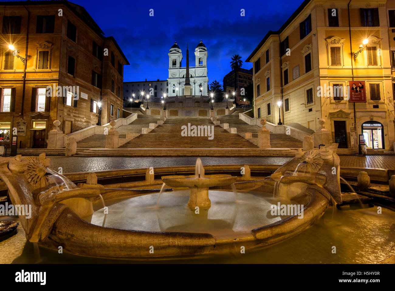 Night view of Fontana della Barcaccia and Spanish Steps, Piazza di Spagna, Rome, Lazio, Italy Stock Photo