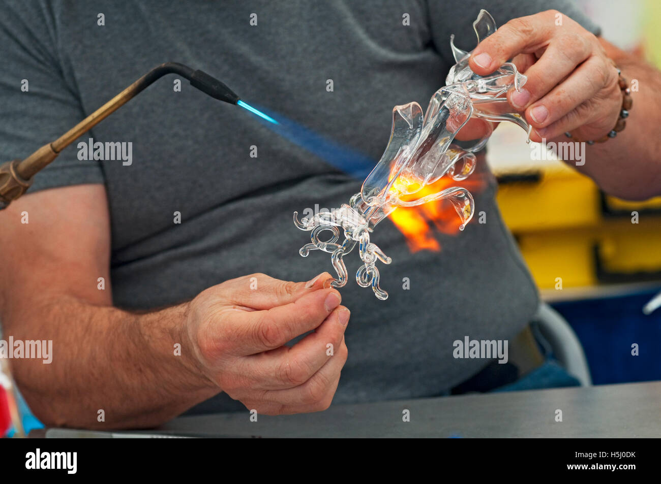 Glassblower Creating a Glass Figurine Stock Photo - Alamy