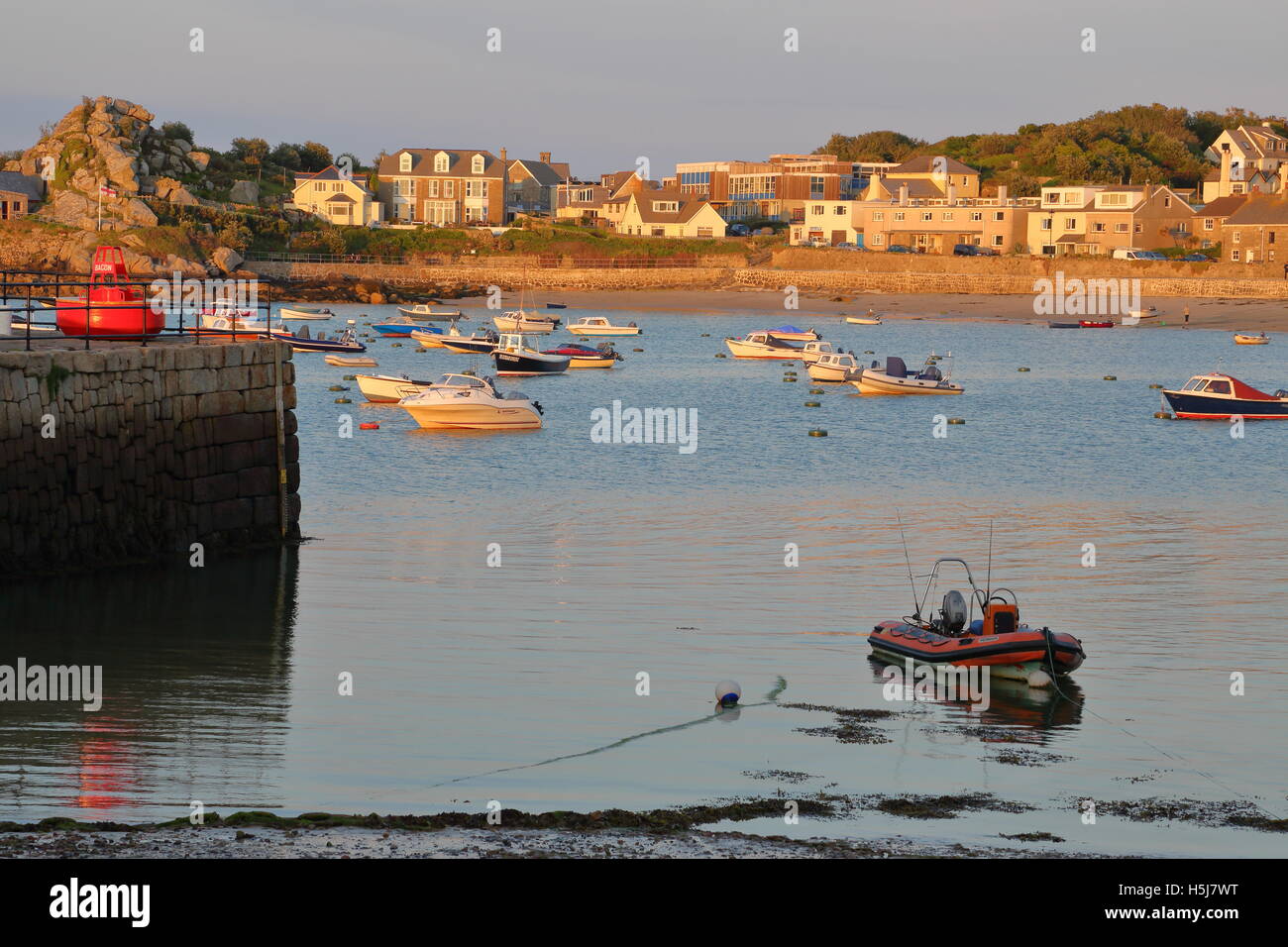 St. Mary's harbour in the evening sun on the Isles of Scilly Stock Photo