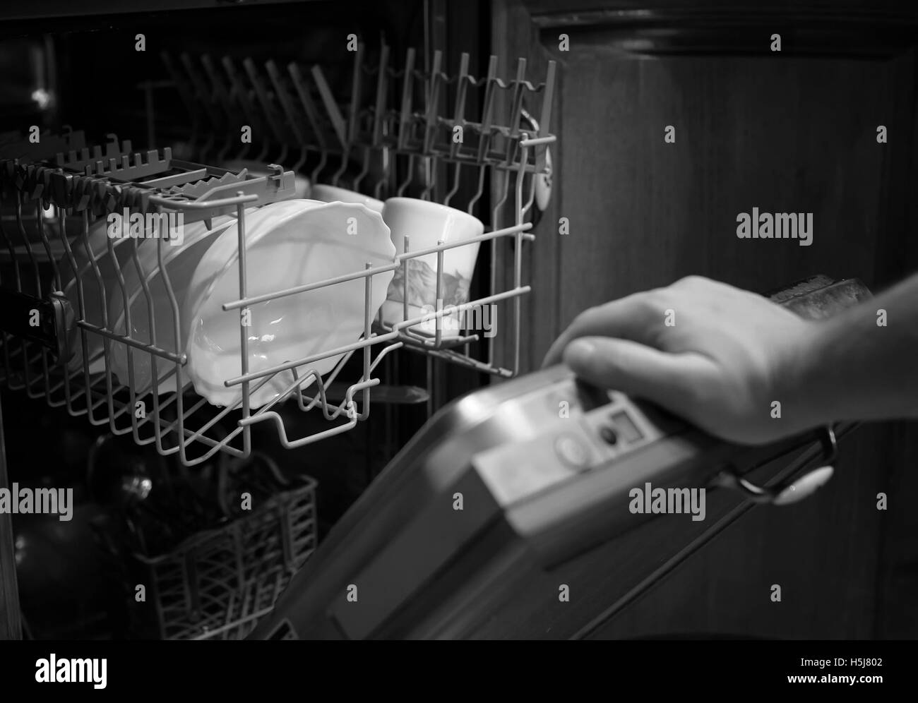 monochrome dishwasher door open Stock Photo Alamy