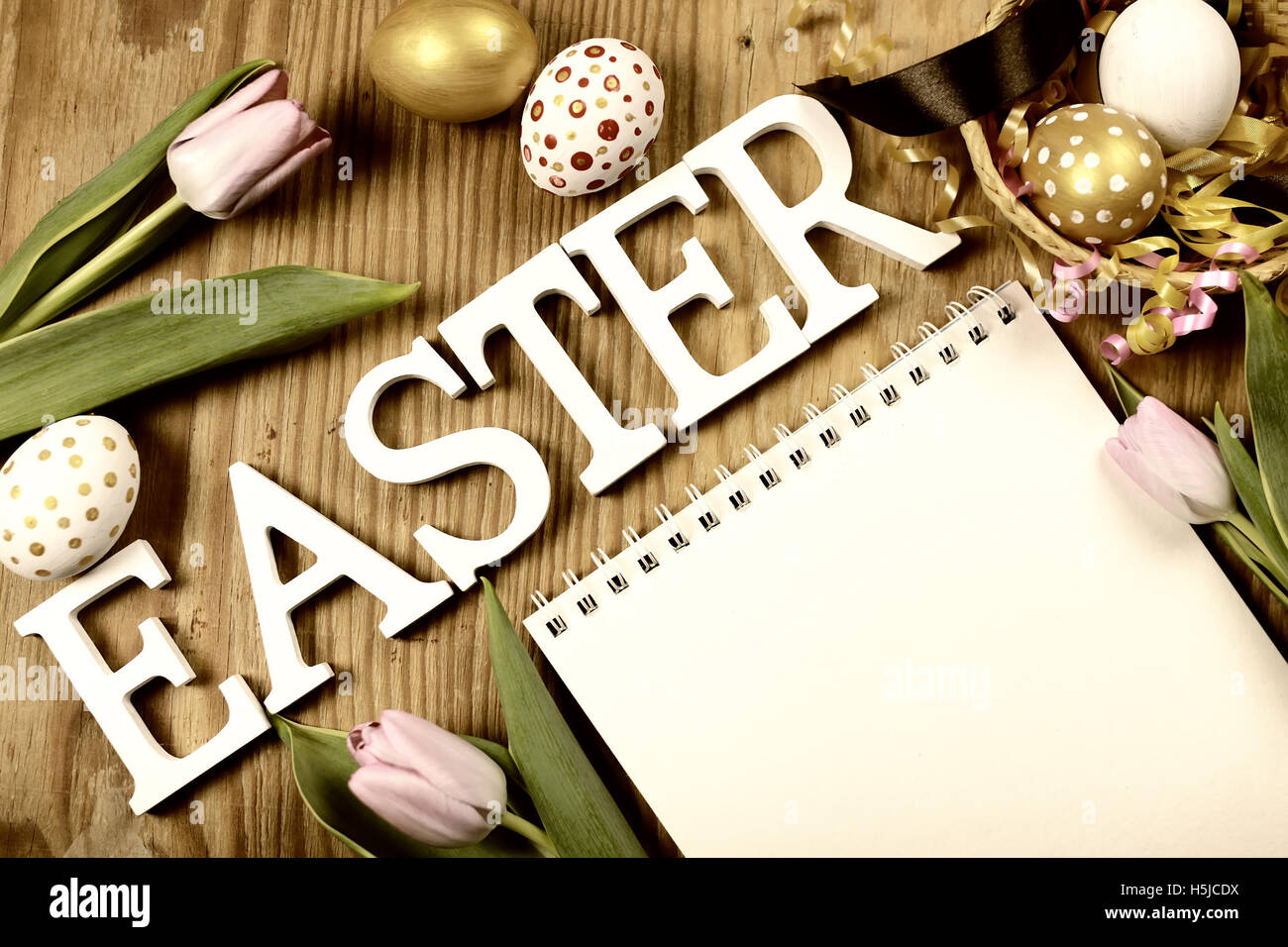 Toned background easter tulips and eggs Stock Photo - Alamy