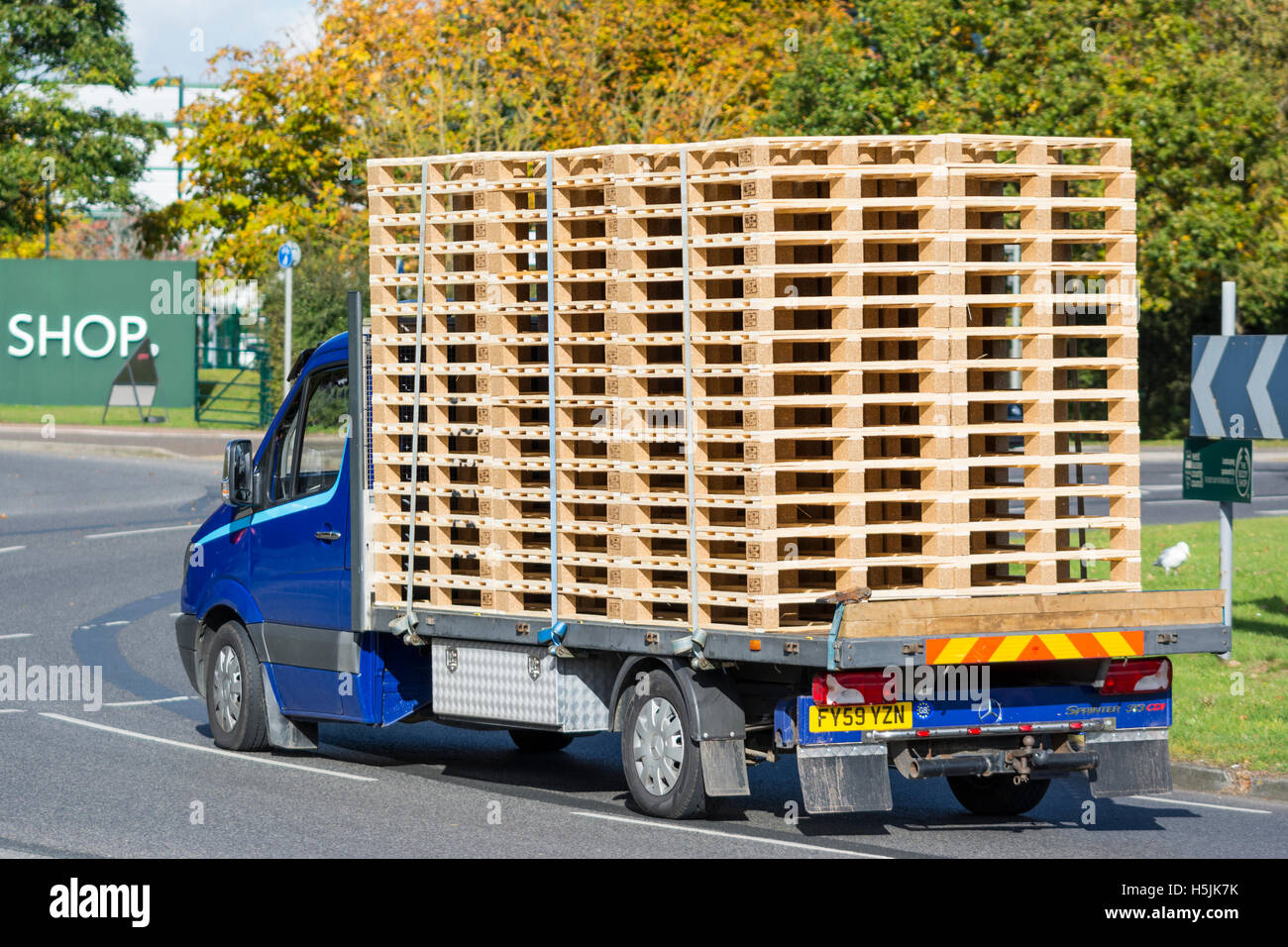 Wooden pallets being transported on a van. Stock Photo