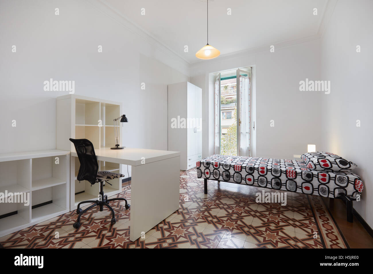 Bedroom interior with single bed in normal apartment Stock Photo