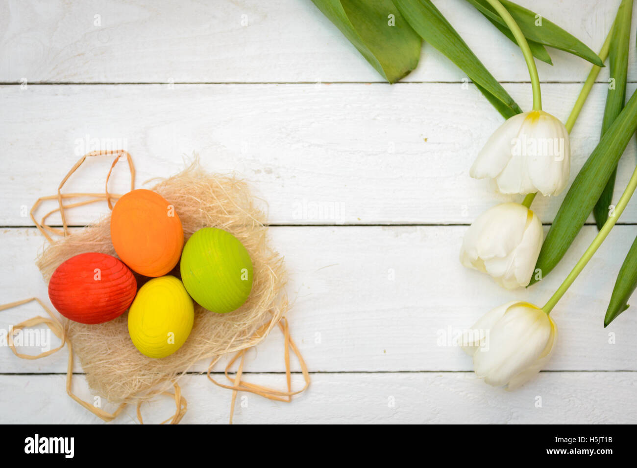 Easter Eggs and tulips on old white wood - Season Background Frame ...