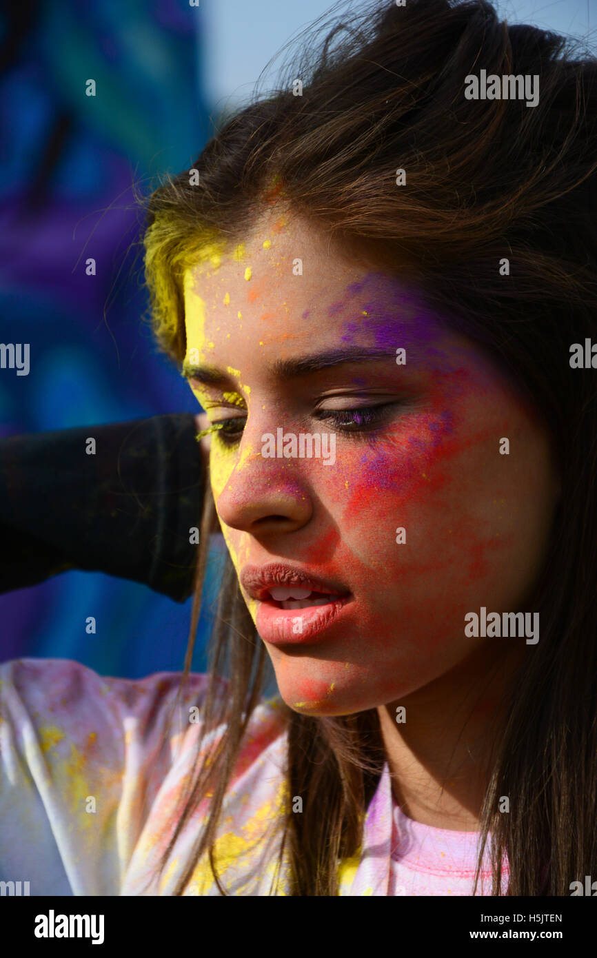 Beautiful girl at color running race. Stock Photo