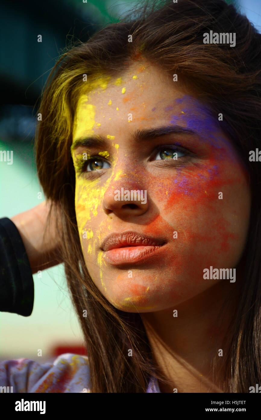 Beautiful girl at color running race. Stock Photo