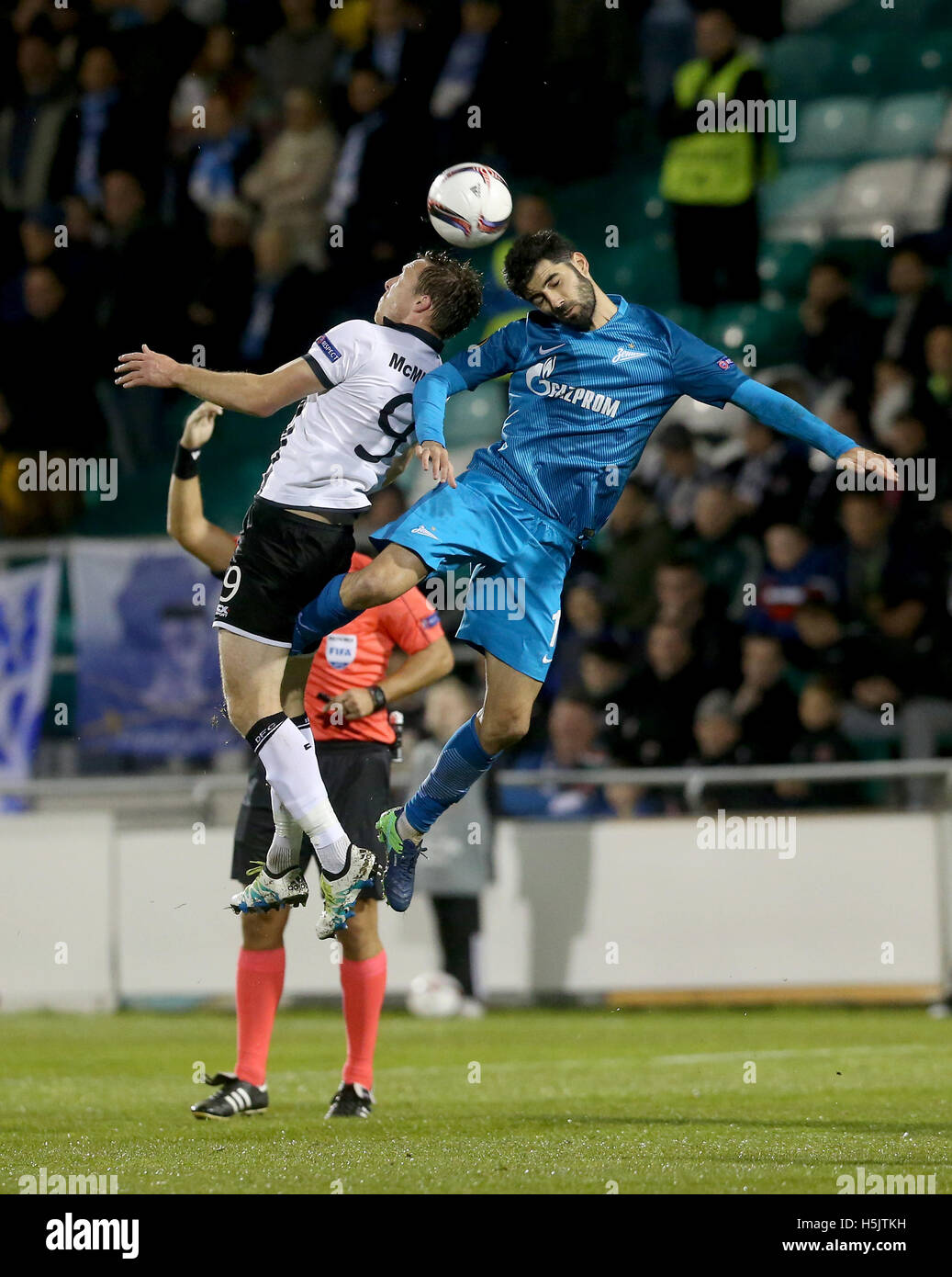Dundalk's David McMillan (left) and Zenit St Petersburg's Luis Neto battle for the ball during the UEFA Europa League match at Tallaght Stadium, Dublin. Stock Photo