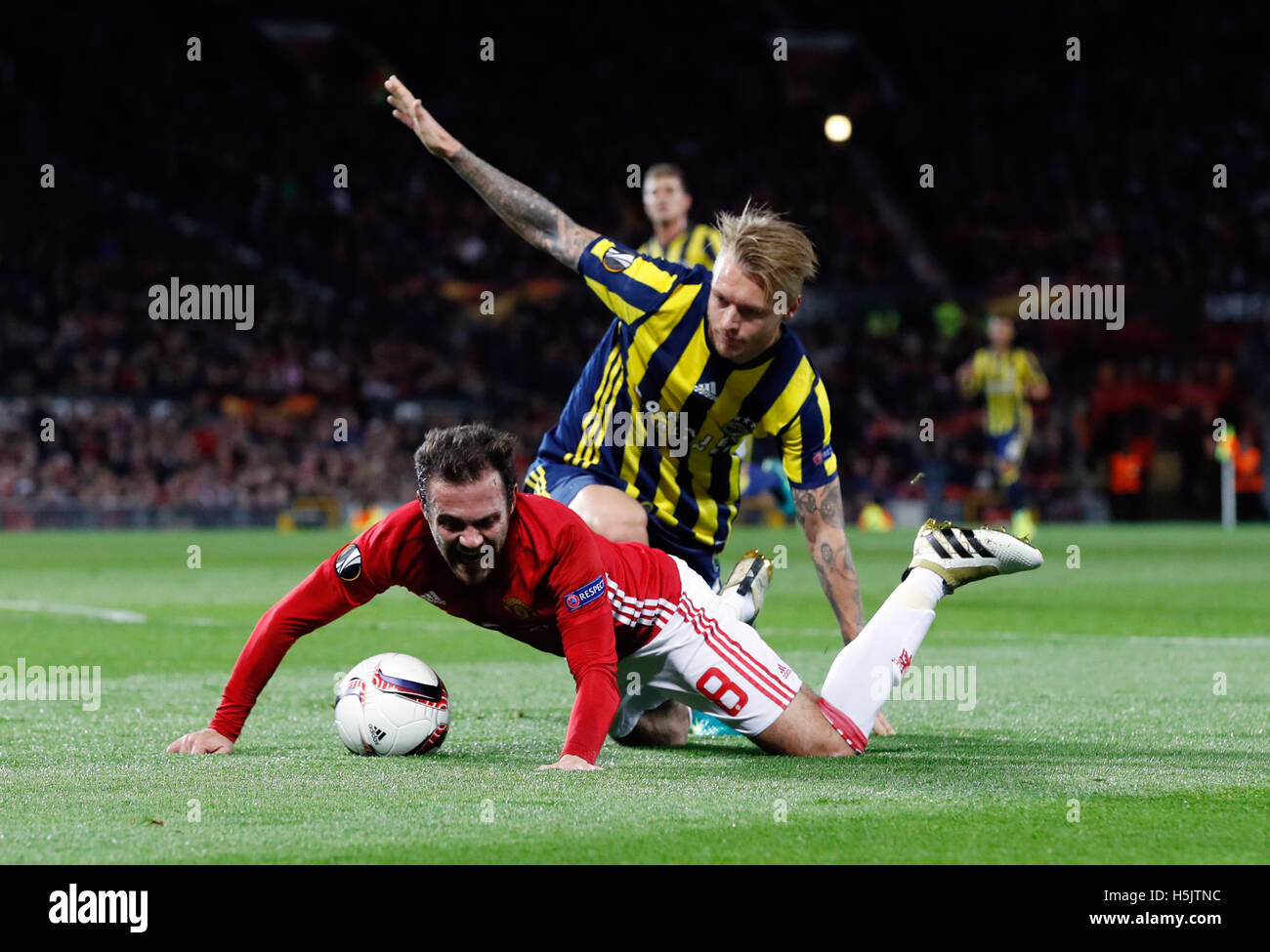 Fenerbahce S Simon Kjaer Brings Down Manchester United S Juan Mata Inside The Box Resulting In Manchester United S First Penalty During The Uefa Europa League Match At Old Trafford Manchester Stock Photo Alamy