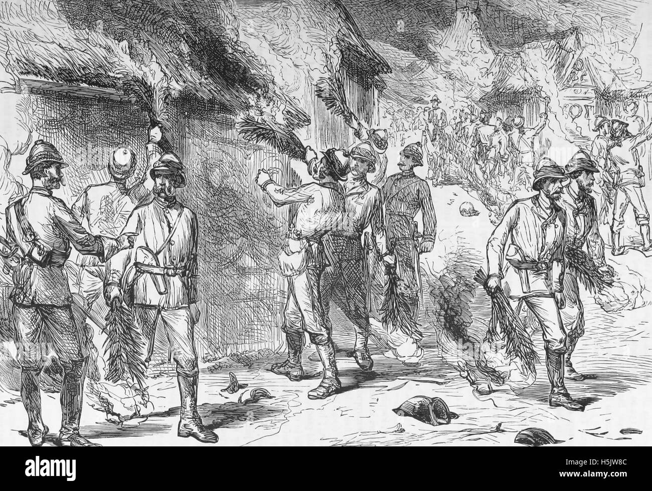 THIRD ASHANTI WAR 1873-1874  British troops set fire to Kumasi on  4 February 1874. Engraving from The Graphic Stock Photo