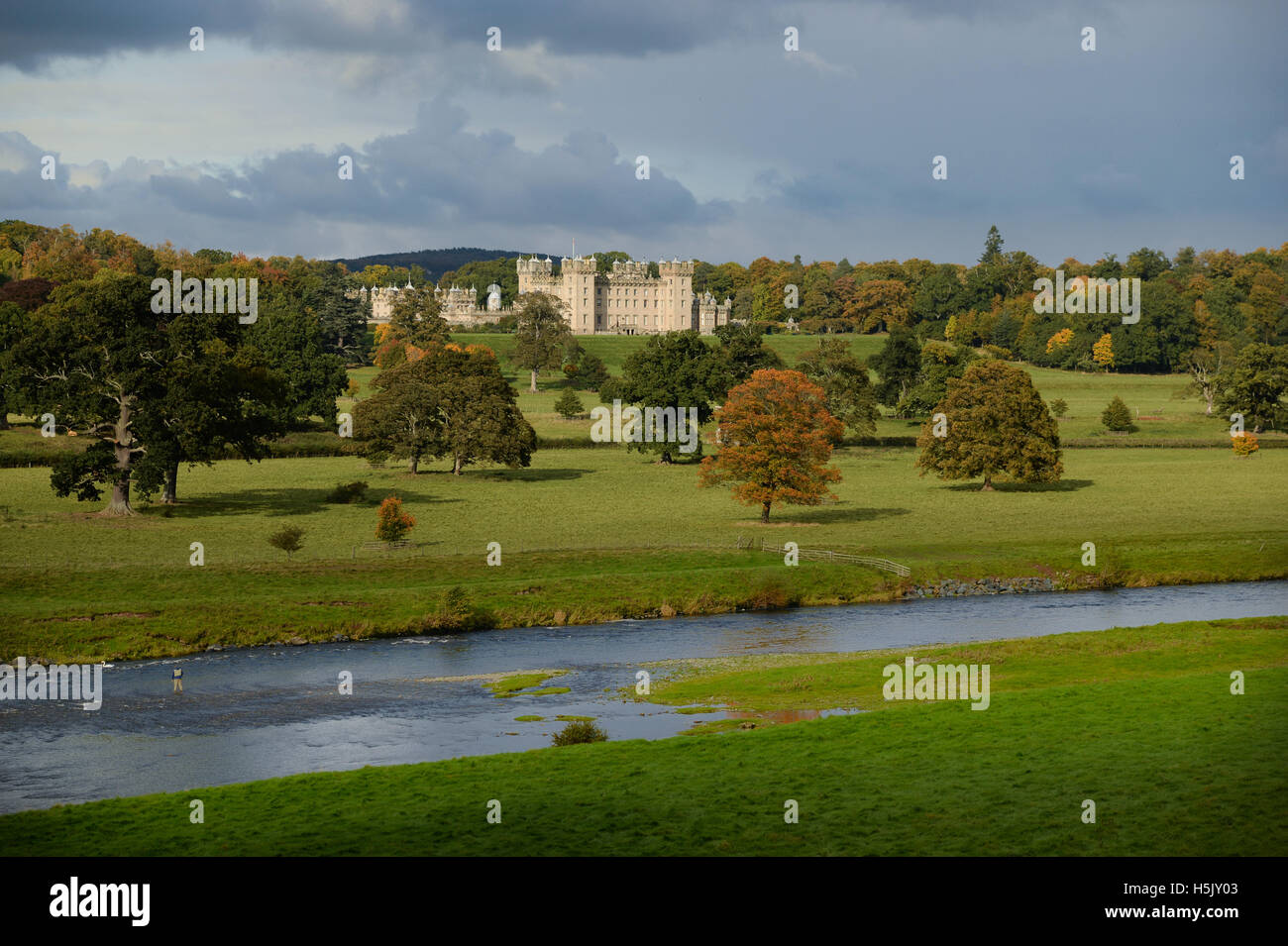 Floors Castle overlooking the River Tweed and facing the Cheviot Hills, the heartland of the Duke of Roxburghe's family Estate. Stock Photo