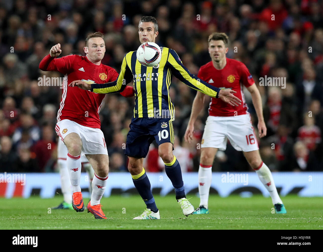 Manchester United's Wayne Rooney (left) and Fenerbahce's Robin van