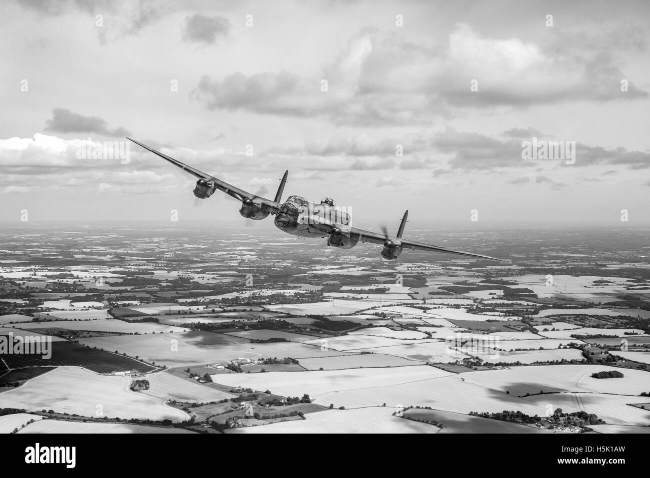 A Lancaster bomber on the run in to its home airfield in eastern England. Stock Photo