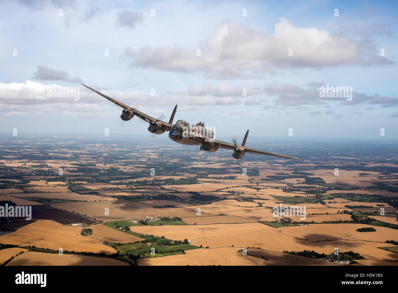 A Lancaster bomber on the run in to its home airfield in eastern England. Stock Photo