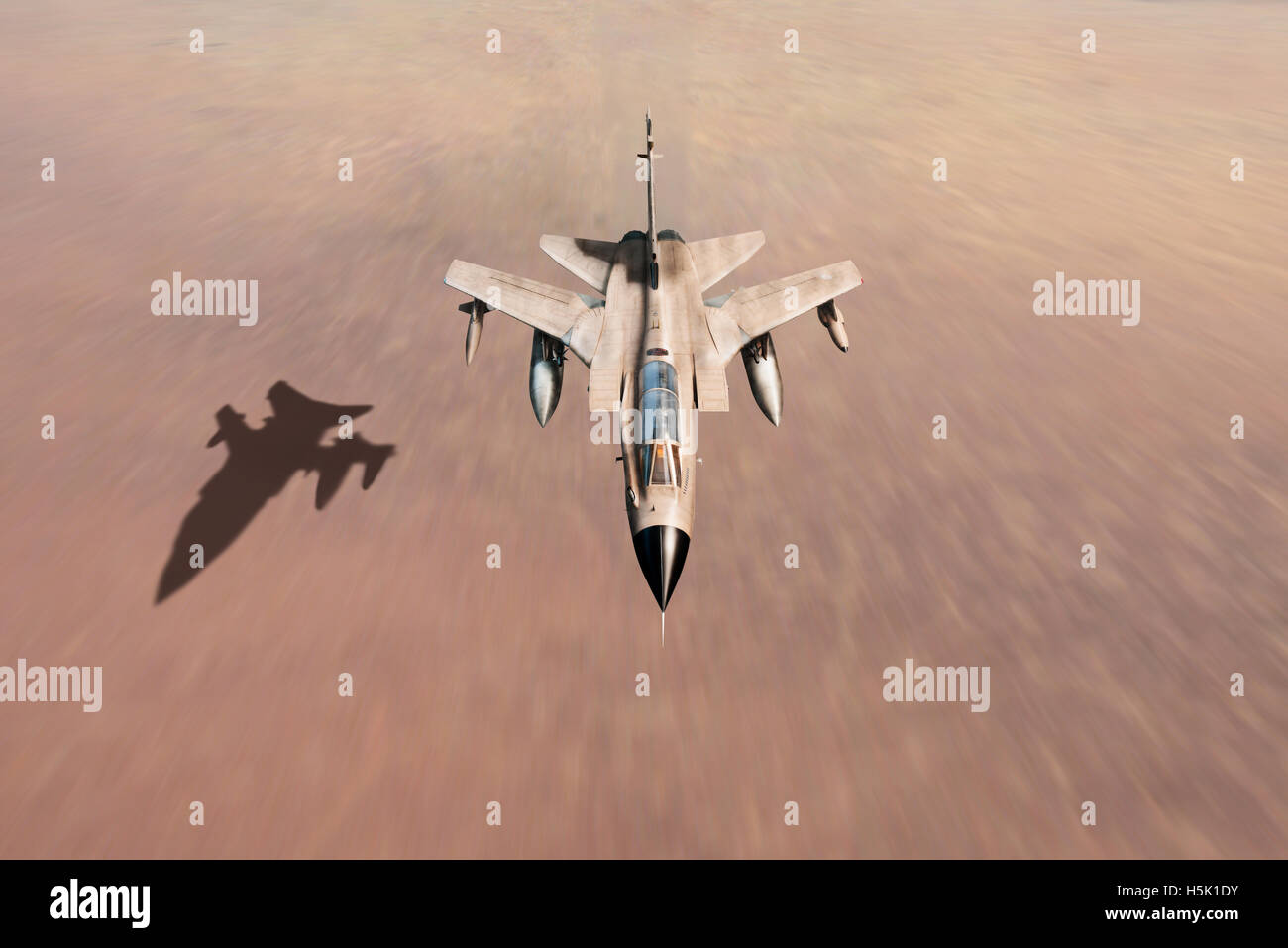 A depiction of a Royal Air Force Tornado GR.1 at low level over the Iraqi desert during Operation Desert Storm. Stock Photo
