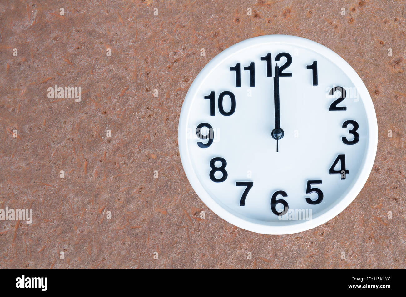 12am 12pm Clock On Wooden Table Stock Photo 611748464