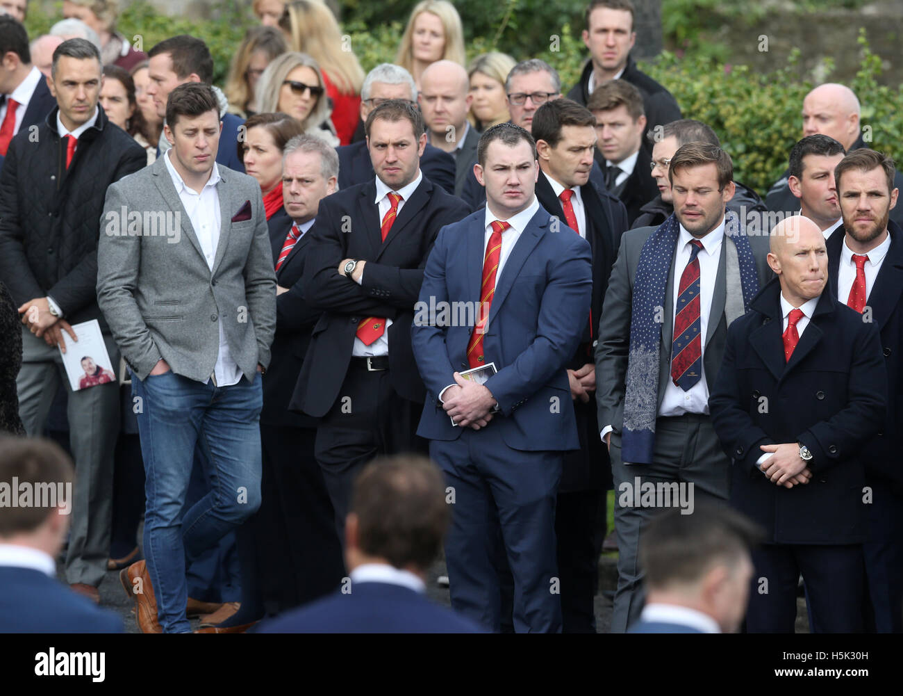 Sale Rugby's Peter String (right) awaits the arrival of the hearse at ...