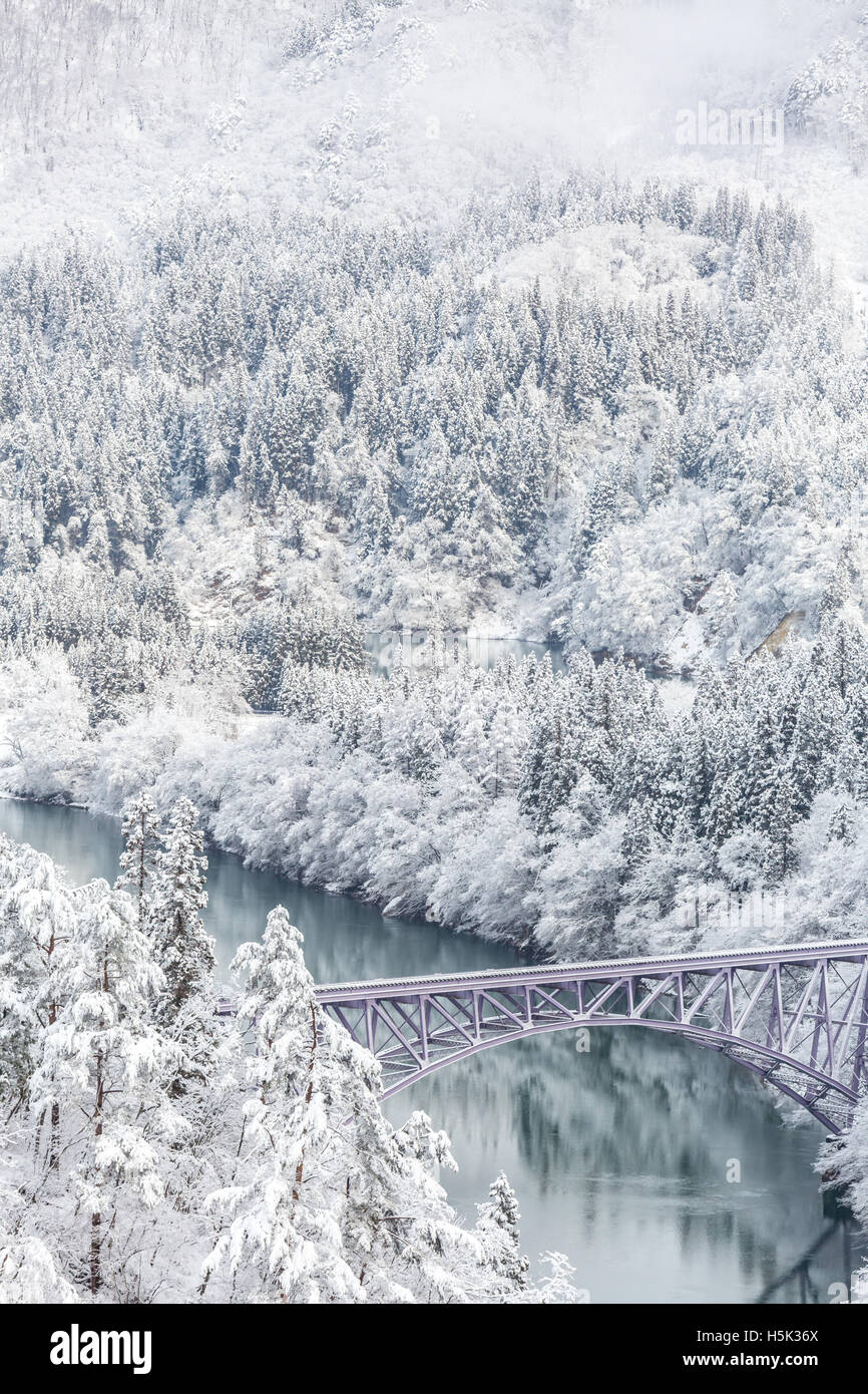 Winter landscape snow covered trees with River and Bridge Stock Photo ...