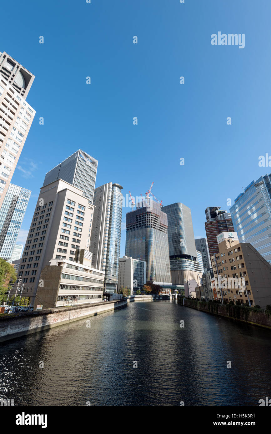 Osaka, Japan - December 1, 2015: Kyū-Yodo River  and  skyscrapers of downtown Osaka, Japan. O Stock Photo