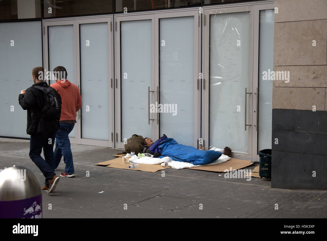 Homeless man with possessions in  Buchanan street, Glasgow Stock Photo