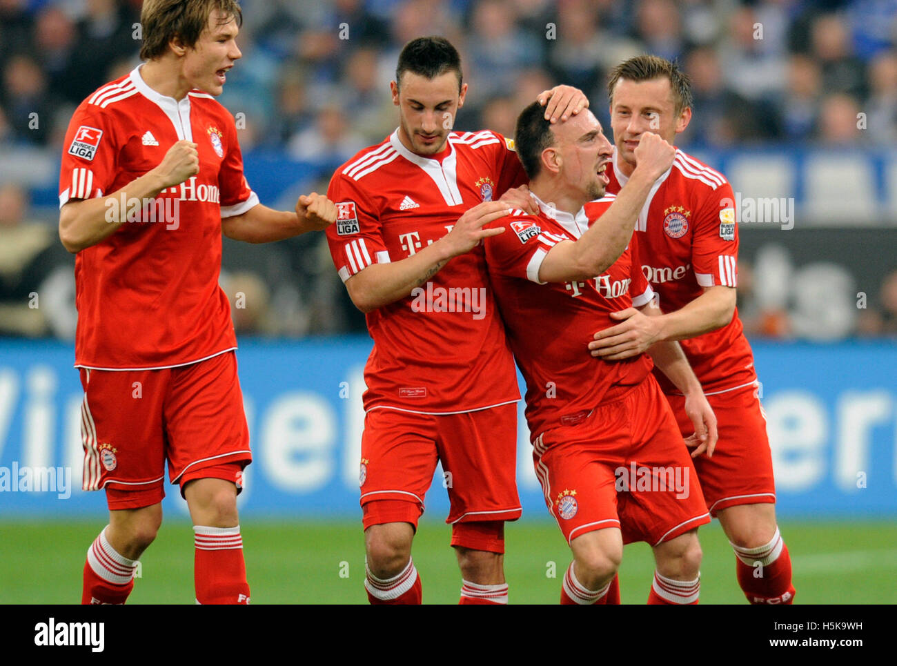 Franck Ribery cheering after his goal 0-1, from left: Holger Badstuber, Diego Contento, Franck Ribery and Ivica Olic, FC Schalke Stock Photo