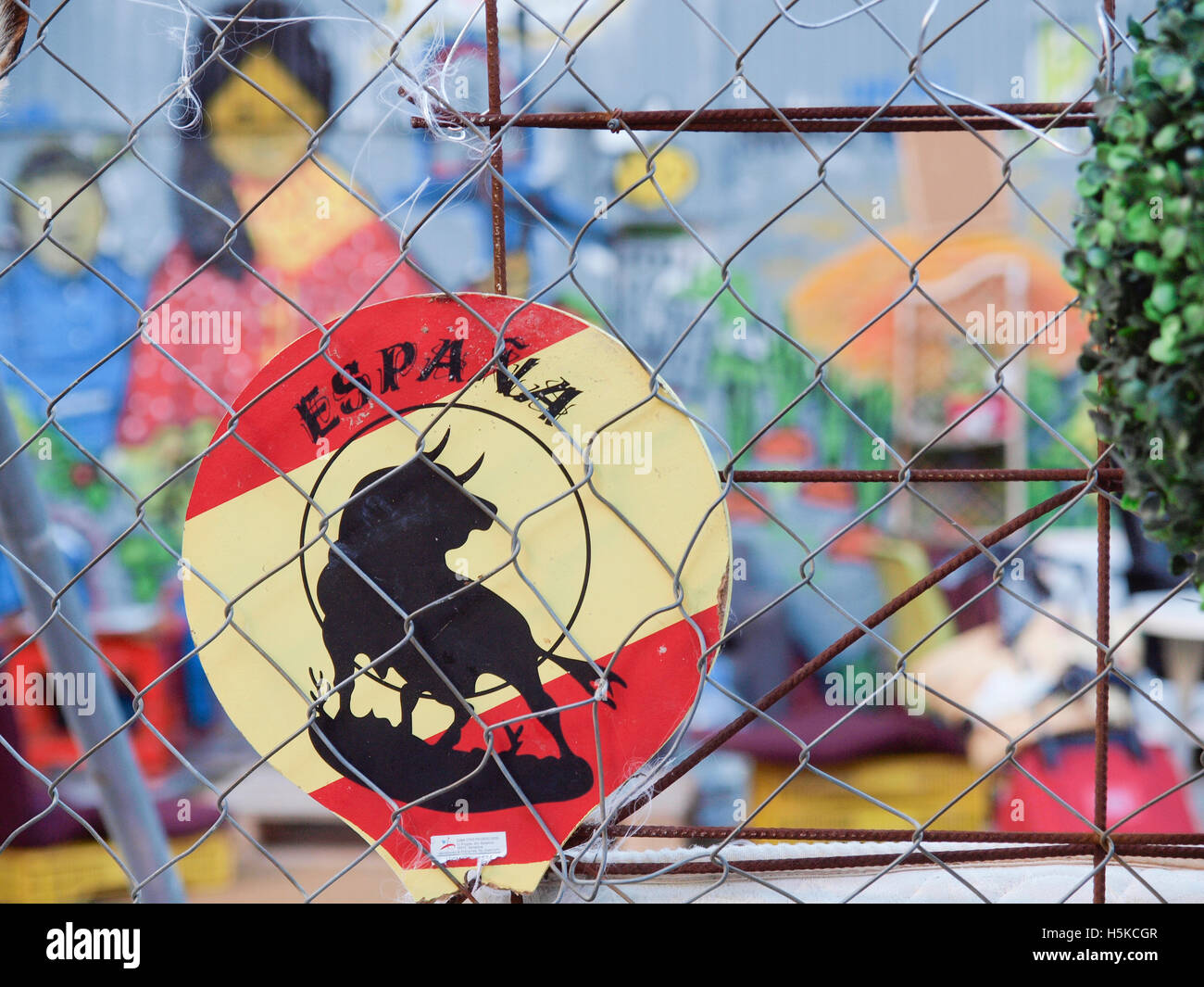 CHAIN LINK FENCE WITH ITEMS HANGING FROM IT BARCELONA SPAIN Stock Photo