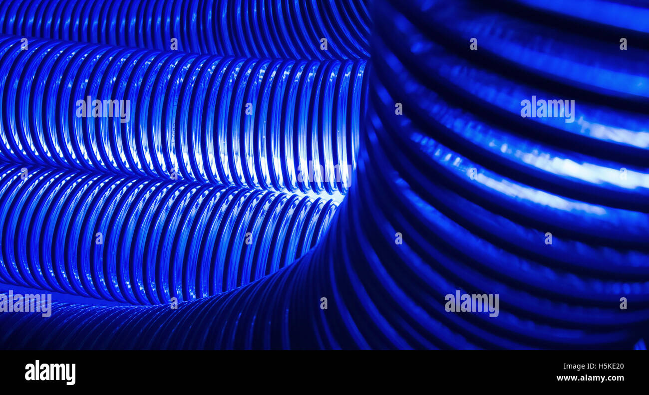 Blue plastic elastic pipe Stock Photo - Alamy