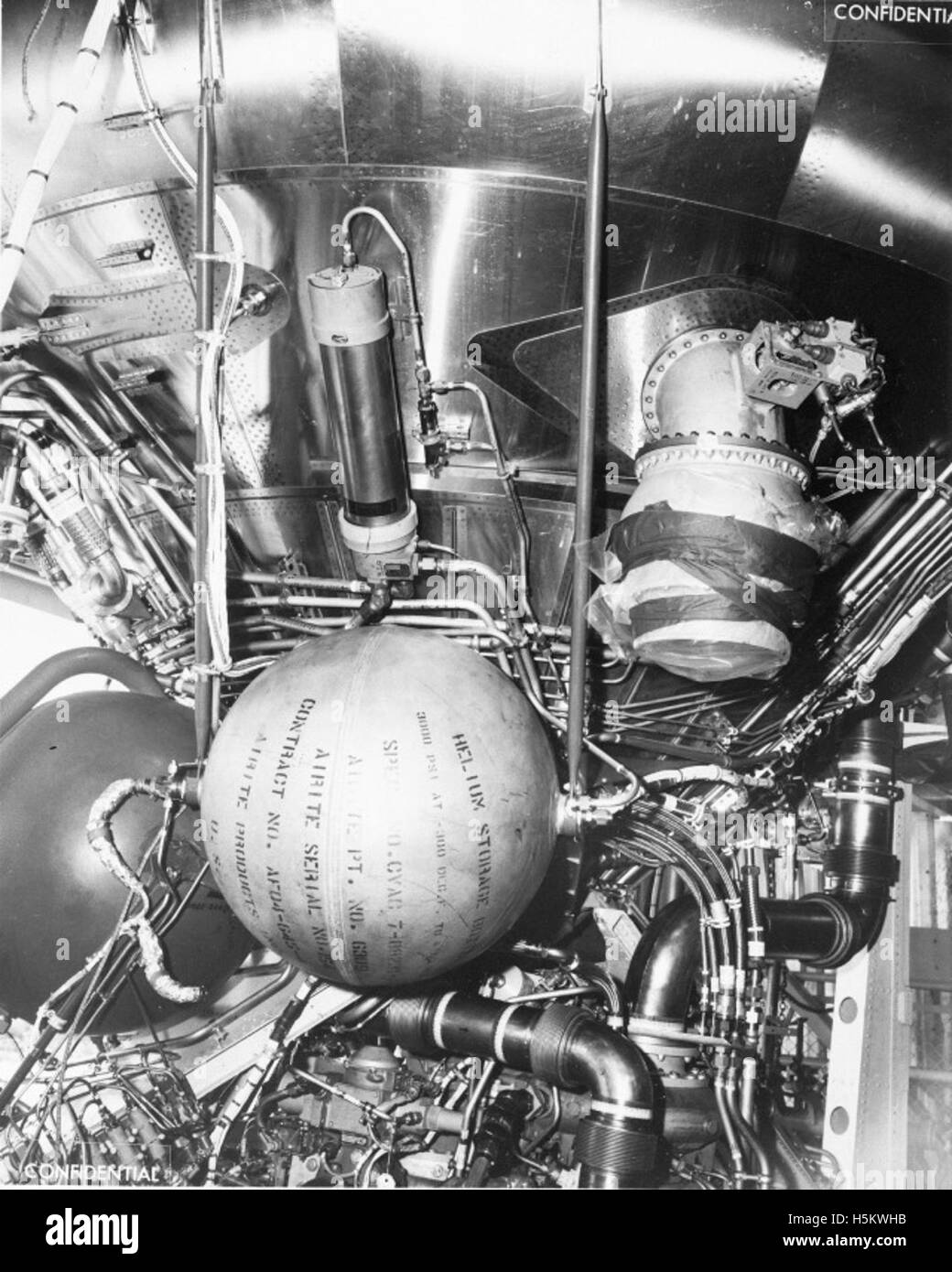 Rocket Inspection A negative image from the Atlas Collection showing engineers inspecting ...