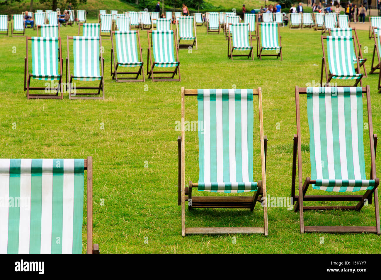 Green stripped deck chairs hi-res stock photography and images - Alamy