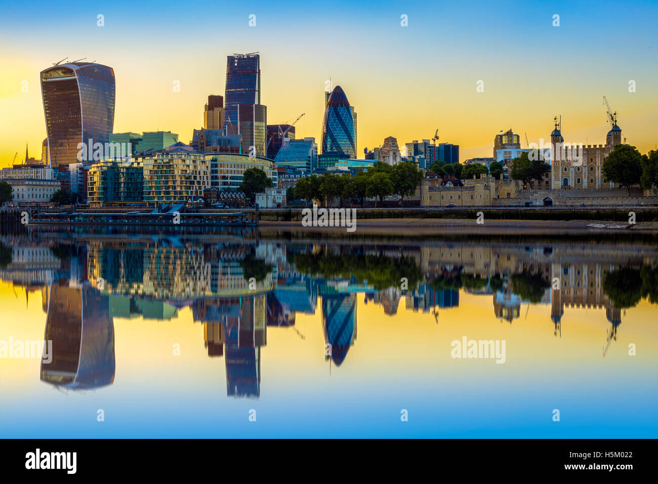 London cityscape at sunset with reflection from river Thames Stock Photo