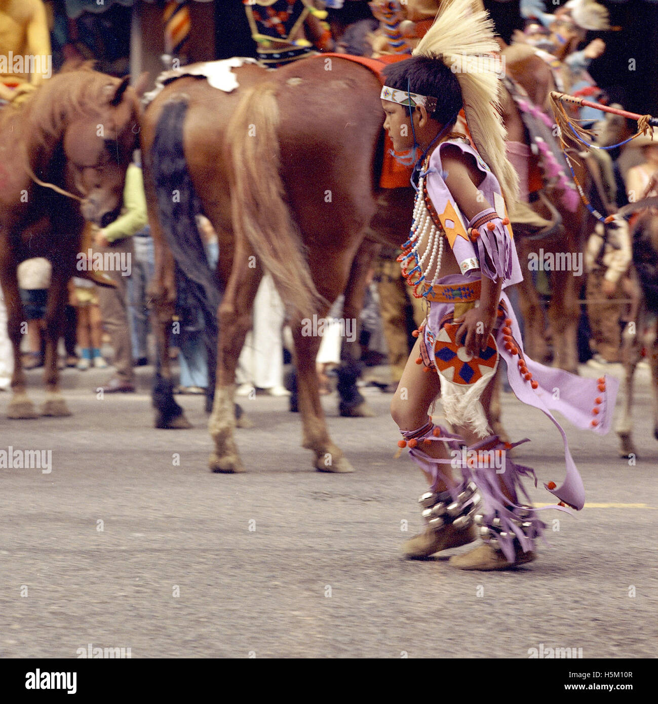 First Nations boy in the Calgary Stampede Parade 283 Stock Photo - Alamy